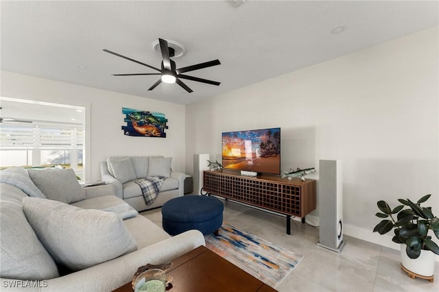 living room featuring ceiling fan