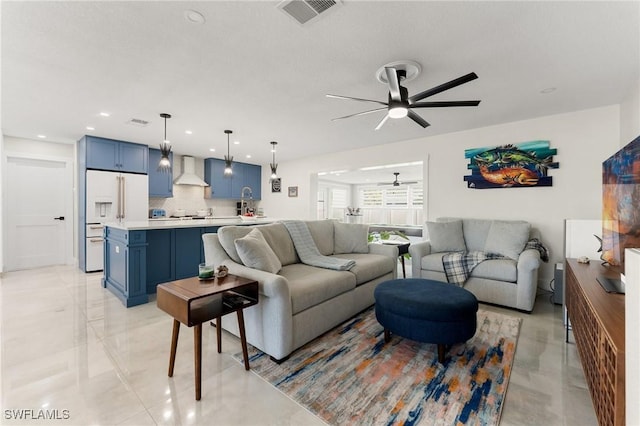 living room featuring ceiling fan