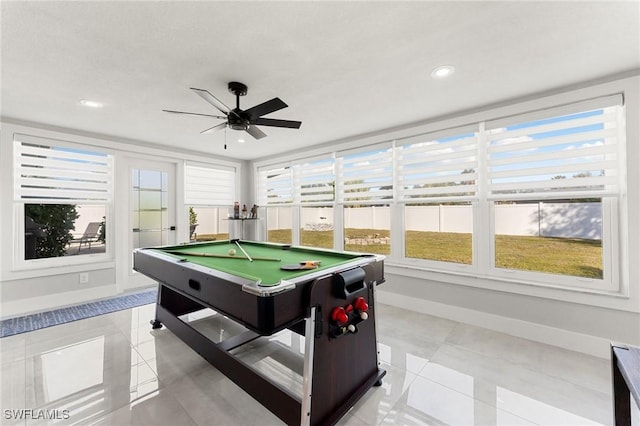 recreation room with billiards, ceiling fan, and light tile patterned flooring