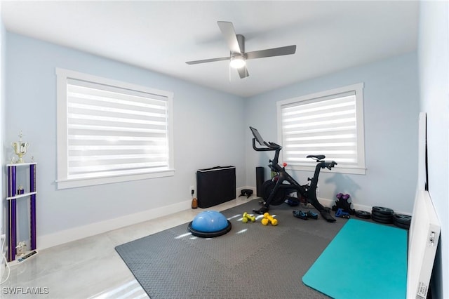 exercise room featuring ceiling fan