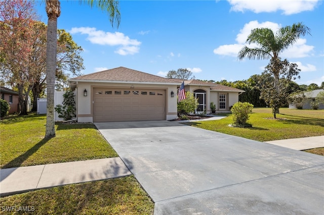 view of front facade featuring a garage and a front yard