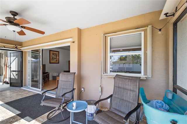 view of patio with ceiling fan