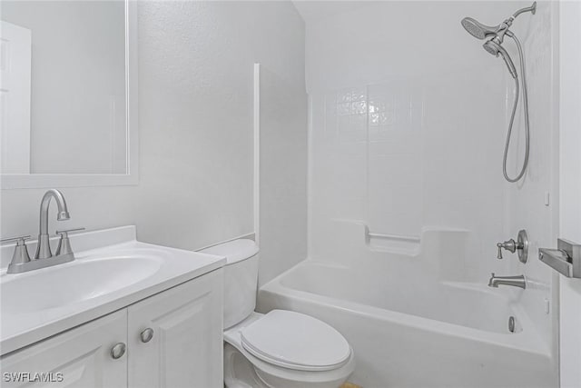 full bathroom with bathing tub / shower combination, vanity, and toilet