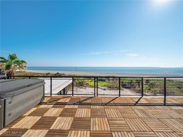 exterior space with a beach view and a water view