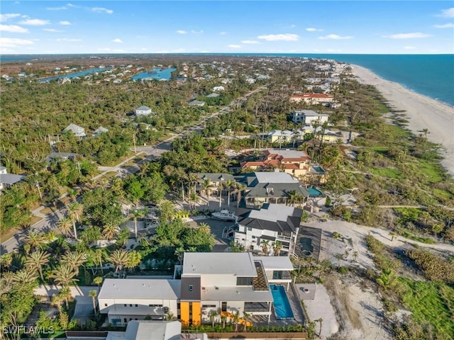 bird's eye view featuring a beach view and a water view