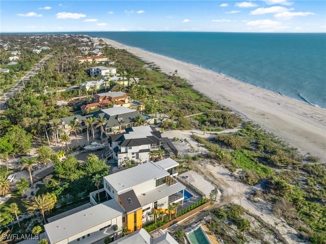 bird's eye view with a view of the beach and a water view