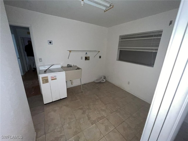 laundry area featuring electric dryer hookup, sink, and washer hookup