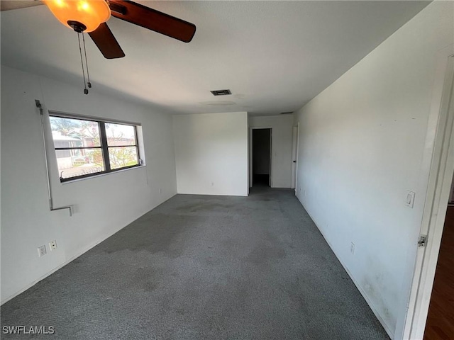 21551 Madera Rd, Fort Myers Beach, FL 33931 - unfurnished room featuring ceiling fan and carpet flooring