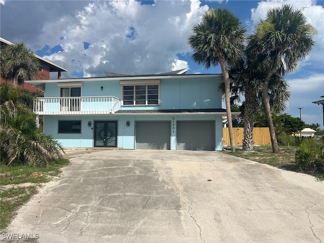 21551 Madera Rd, Fort Myers Beach, FL 33931 - view of front of home with an attached garage and driveway