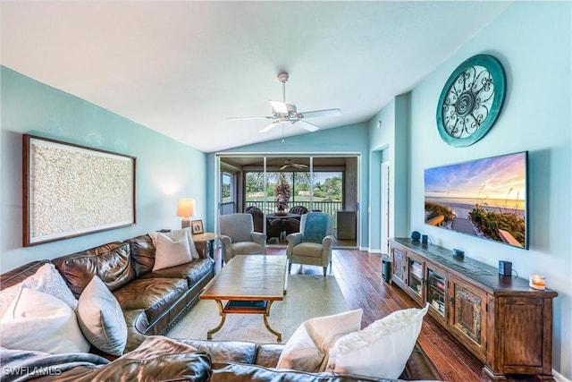 living room with lofted ceiling, dark wood-type flooring, and ceiling fan