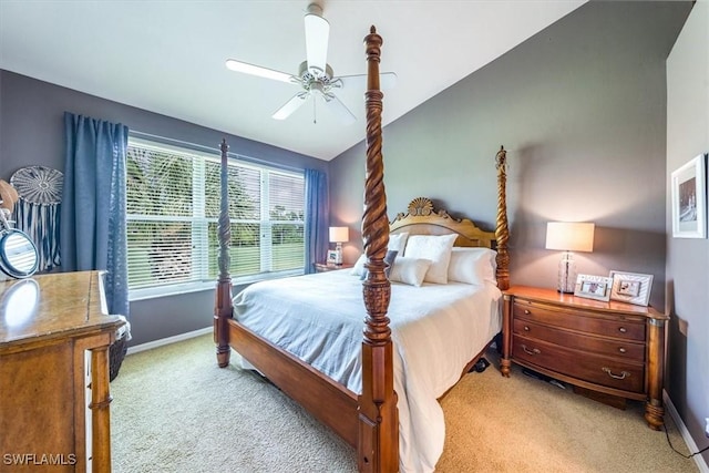 carpeted bedroom featuring lofted ceiling and ceiling fan