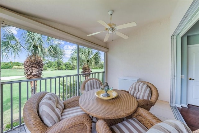 exterior space with ceiling fan