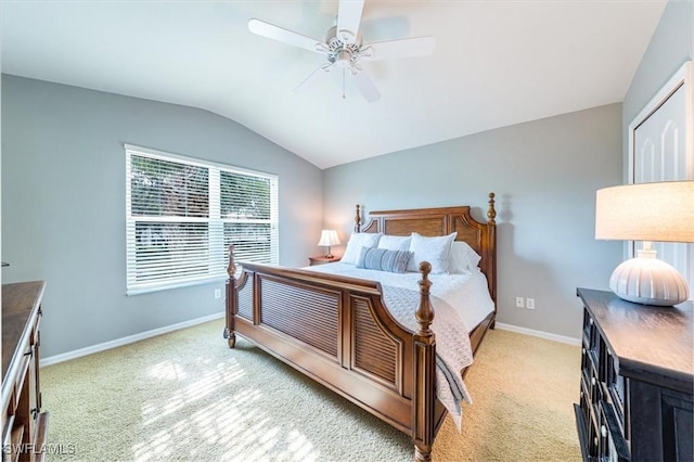 carpeted bedroom with lofted ceiling and ceiling fan