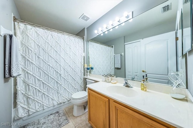 full bathroom with vanity, shower / tub combo, tile patterned floors, and toilet