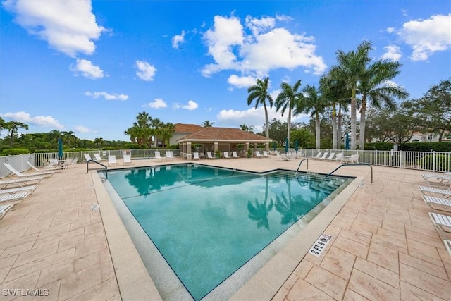 view of swimming pool featuring a patio