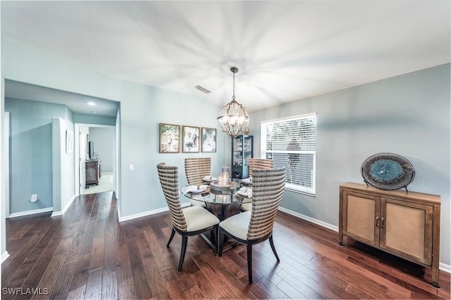 23566 Sandycreek Ter Unit 1409, Estero, FL 34135 - dining room featuring a chandelier and dark wood-style flooring