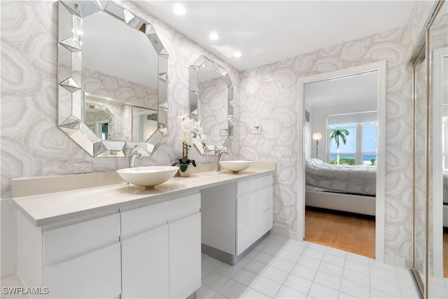 bathroom featuring tile patterned floors and vanity