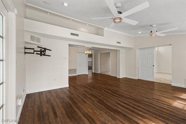 unfurnished living room featuring ceiling fan, dark hardwood / wood-style floors, crown molding, and a textured ceiling