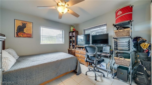 bedroom with light tile patterned floors and ceiling fan