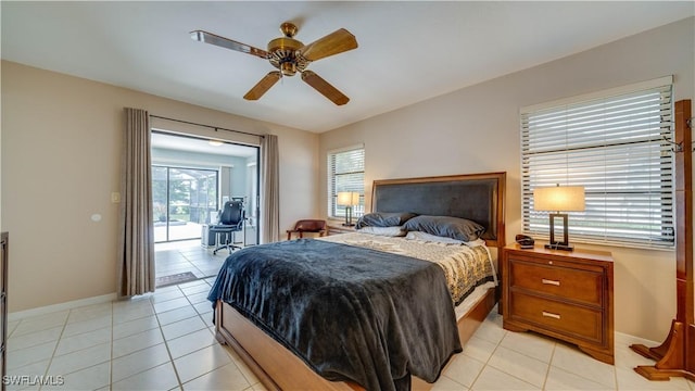 tiled bedroom featuring access to exterior and ceiling fan