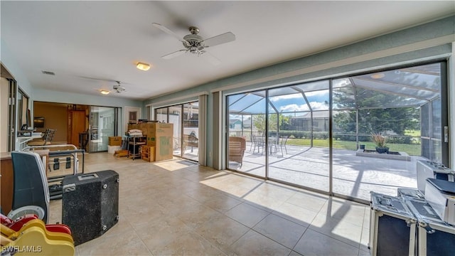 interior space featuring ceiling fan