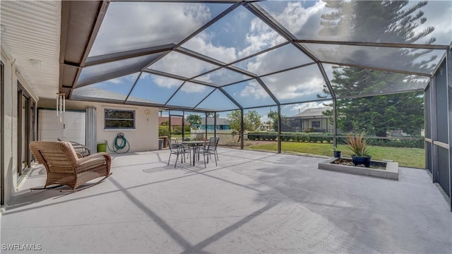 view of patio / terrace with glass enclosure