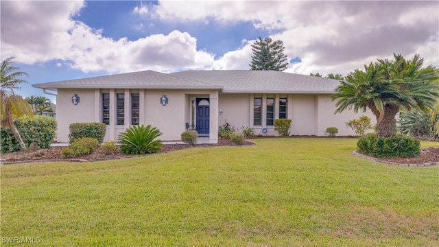 single story home with a front yard