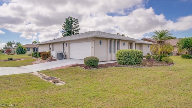 ranch-style home featuring cooling unit, a garage, and a front lawn