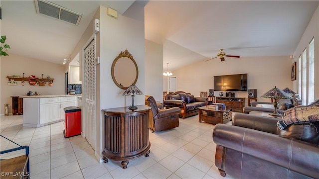 living room featuring light tile patterned flooring, ceiling fan, and lofted ceiling