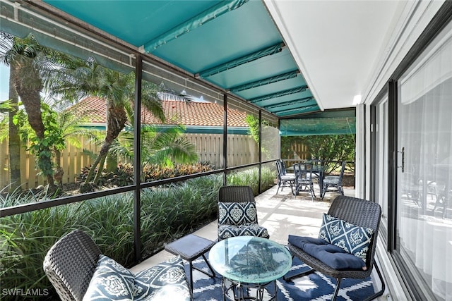 sunroom featuring a healthy amount of sunlight