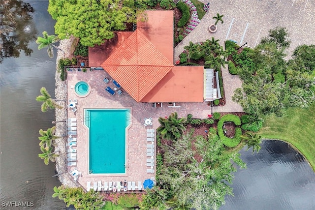 bird's eye view with a water view