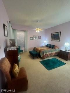 bedroom with ceiling fan and carpet