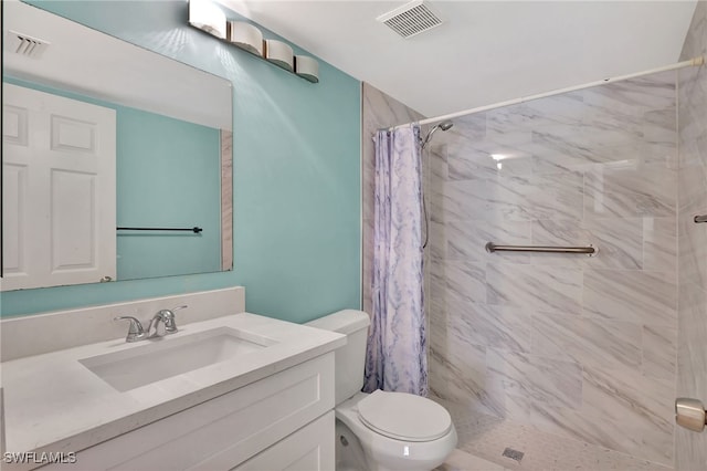 bathroom with walk in shower, vanity, and toilet