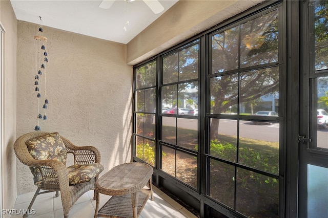 sunroom / solarium with ceiling fan