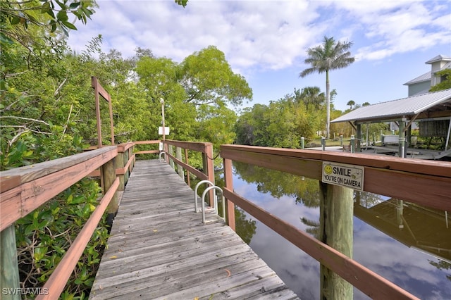 dock area featuring a water view