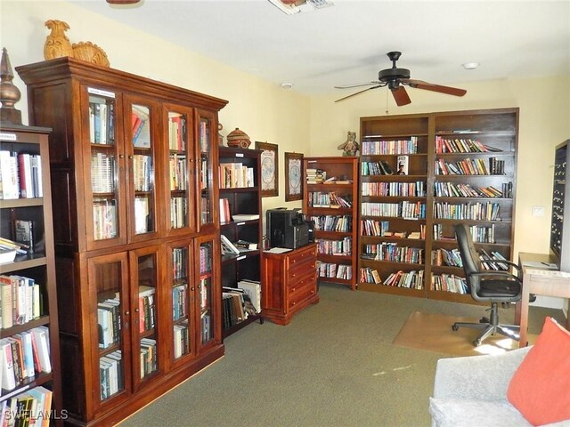 office area with carpet floors and ceiling fan