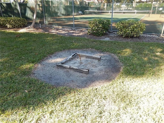 12571 Equestrian Cir Unit 902, Fort Myers, FL 33907 - view of yard featuring a tennis court