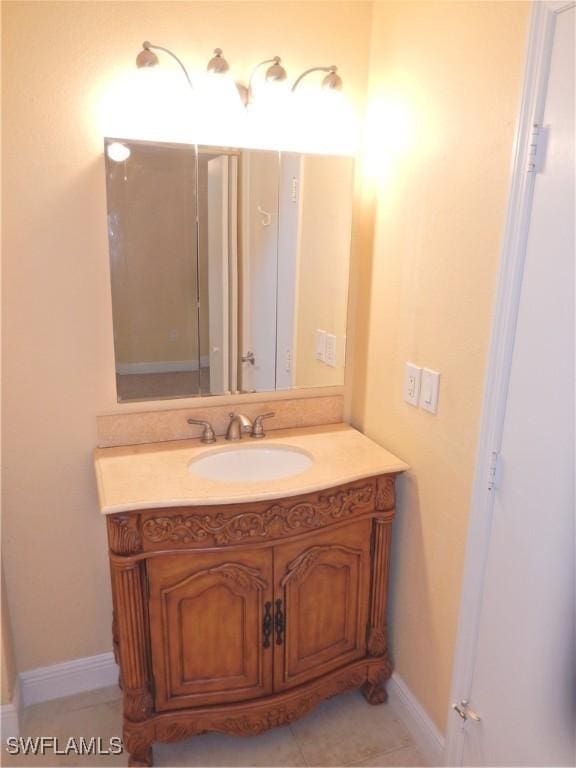 12571 Equestrian Cir Unit 902, Fort Myers, FL 33907 - bathroom with vanity and tile patterned flooring
