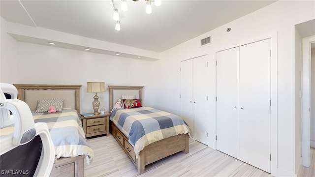 bedroom with two closets