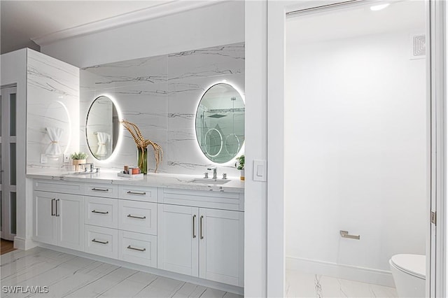 bathroom with vanity and toilet