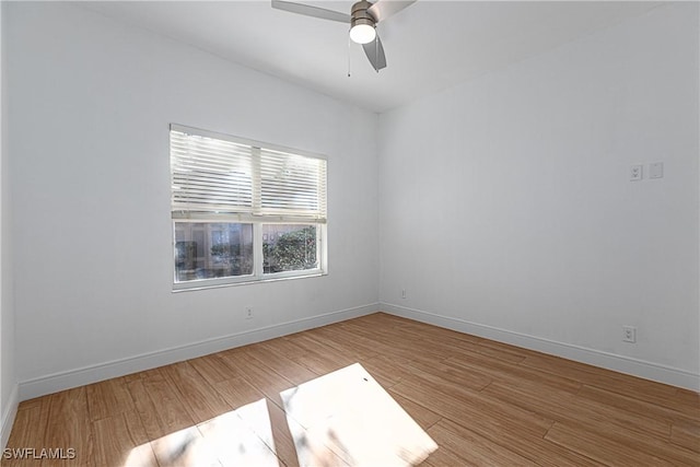 unfurnished room with ceiling fan and light hardwood / wood-style flooring