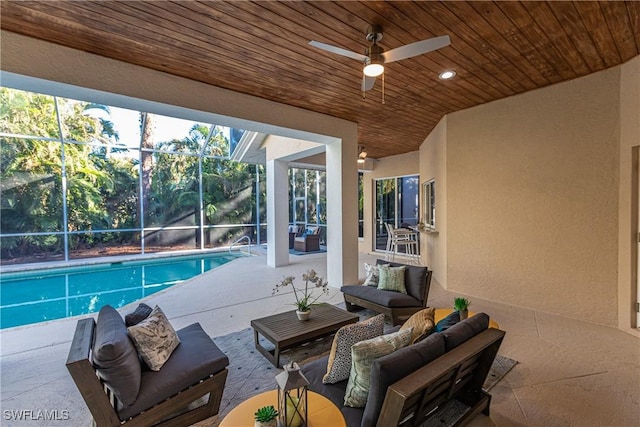 view of swimming pool with ceiling fan
