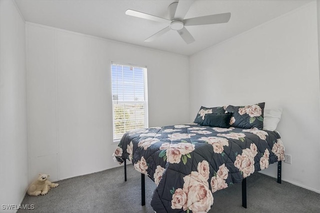 bedroom with ceiling fan and carpet flooring