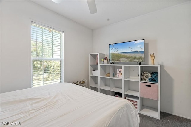 carpeted bedroom with ceiling fan