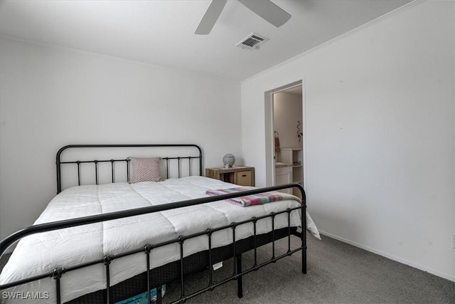 carpeted bedroom featuring ornamental molding and ceiling fan