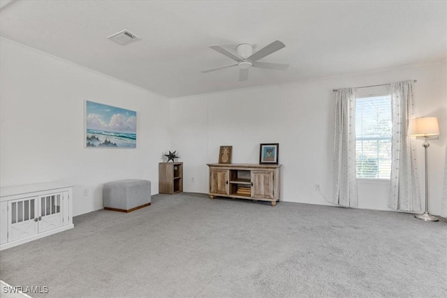 misc room with ceiling fan and carpet floors