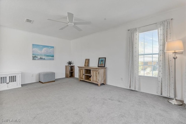 miscellaneous room featuring ceiling fan and carpet