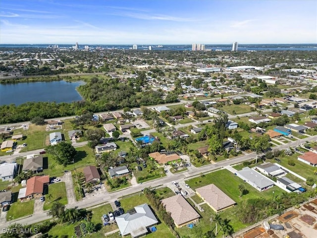 drone / aerial view with a water view