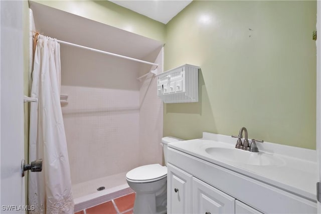 bathroom featuring walk in shower, tile patterned floors, vanity, and toilet