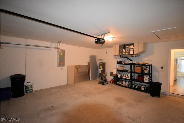 garage featuring a garage door opener, electric water heater, and electric panel